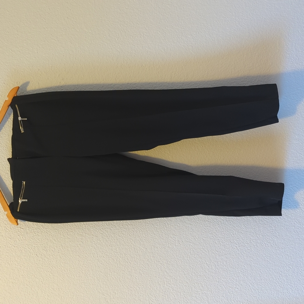 Black pants with silver zipper detail in front